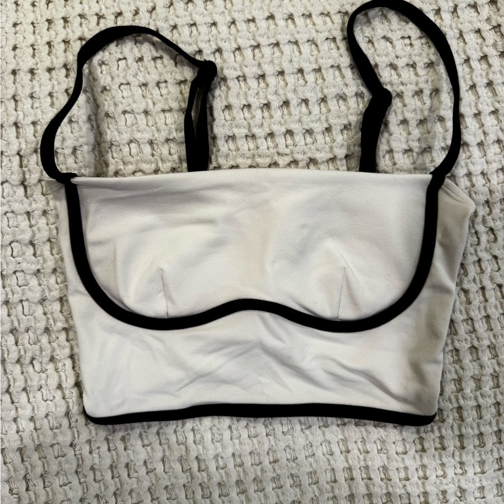 ALO Yoga Cream and Black Bralette